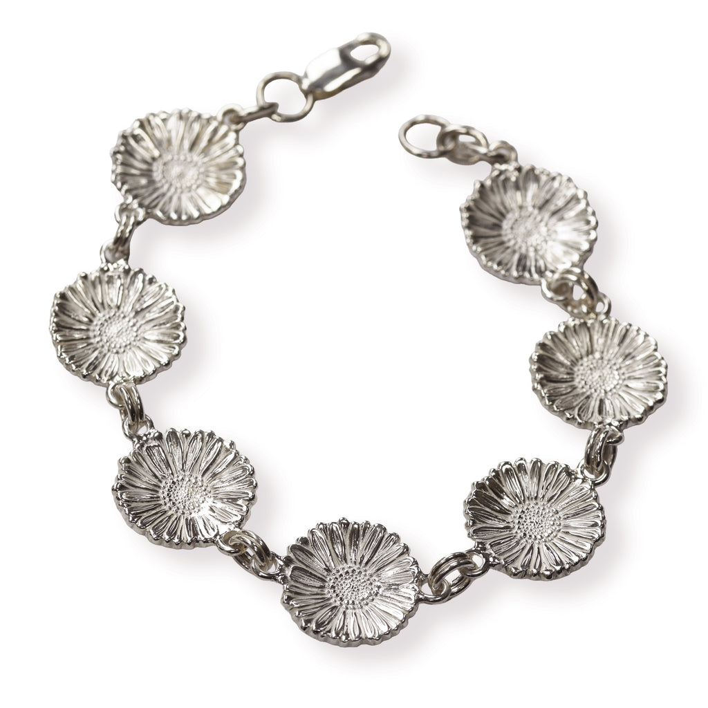 Silver daisy chain bracelet on a white background