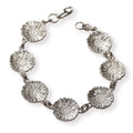 Silver daisy chain bracelet on a white background