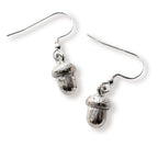Silver acorn-shaped earrings on a white background