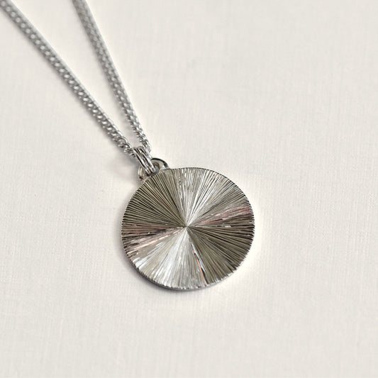 Circle Light Burst Hand Engraved Pendant