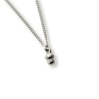 Silver necklace with a small acorn pendant on a white background