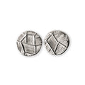 Pair of silver geometric earrings on a white background